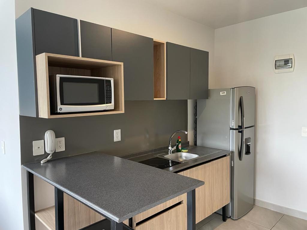 Livup Suites En Zona Iteso 萨波潘 外观 照片
