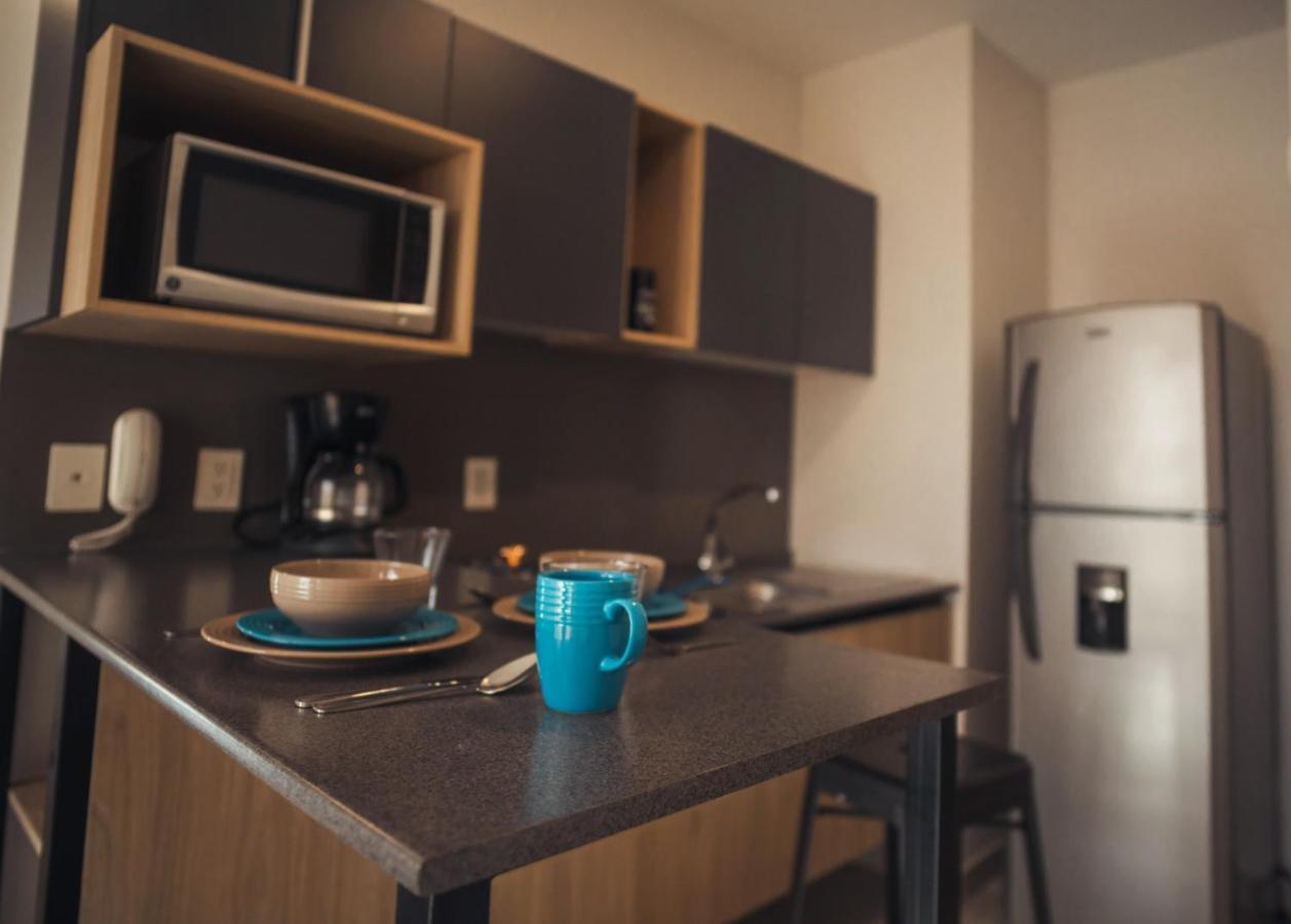 Livup Suites En Zona Iteso 萨波潘 外观 照片